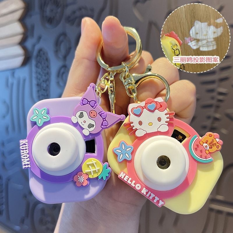 Creative Sanrio projection camera keychain children's toys simulation melody jade dog bag pendant wholesale Creative Sanrio projection camera keychain children's toys simulation melody jade dog bag pendant wholesale