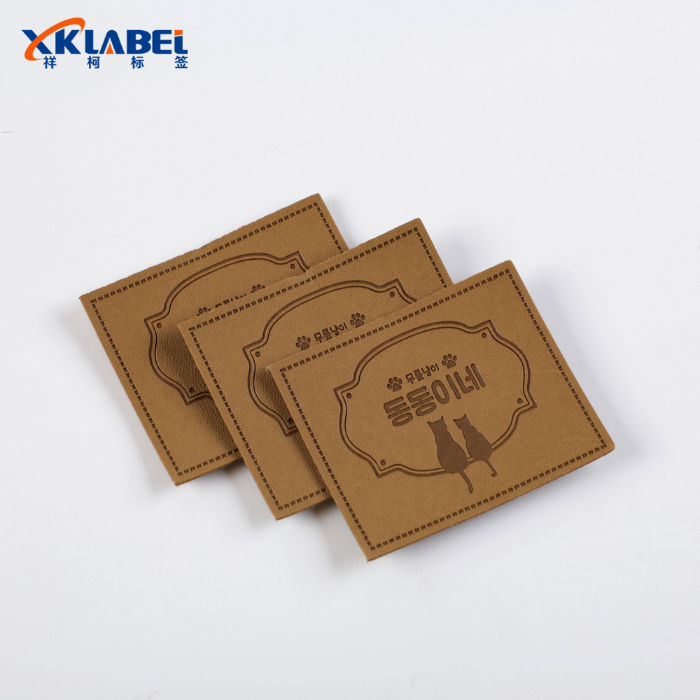 廠家供應服裝壓印皮標皮牌商標男女裝箱包牛仔褲仿皮PU標logo制作