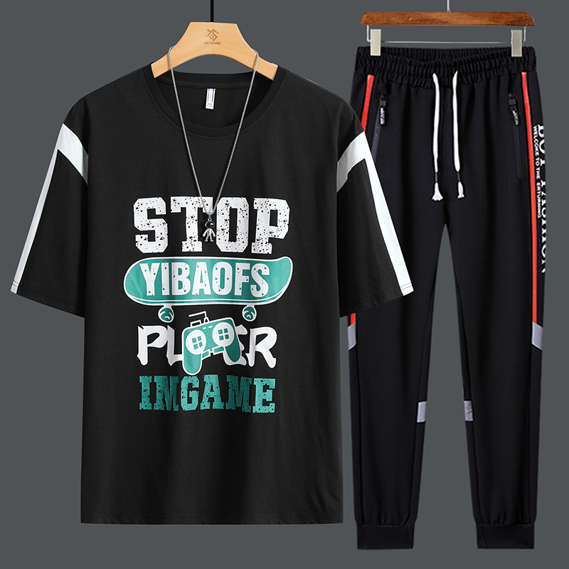 Conjunto de dos piezas de camiseta de cuello redondo holgada y deportiva informal juvenil de moda para el verano 2025 con pantalones y traje de manga corta para hombre
