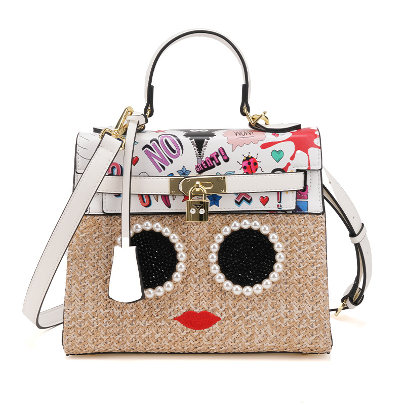 Europa y los Estados Unidos de alto nivel sensación de tela de paja características de diseño bolsas de graffiti de escritorio de diamantes para mujeres colisión de color bolsa de aceite cerradura 1993 #