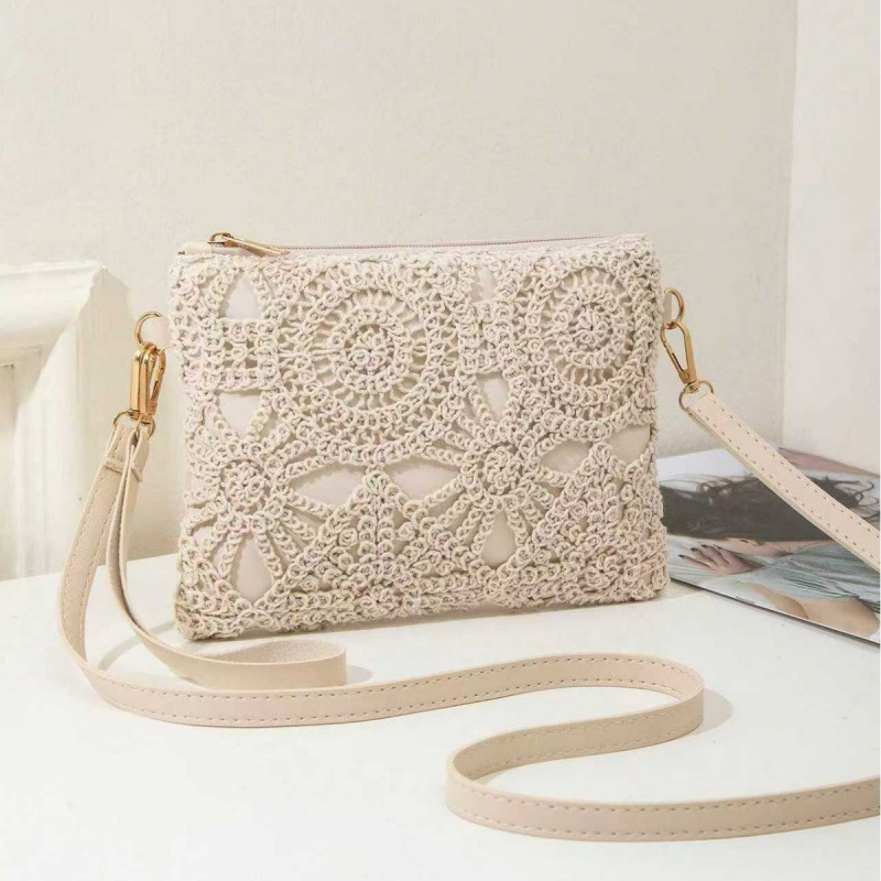 Bolsas de paja casuales coreanas, bolsas de mujer retro de playa, bolsas huecas, nuevas flores de moda de un solo hombro, bolsas de ganchillo.