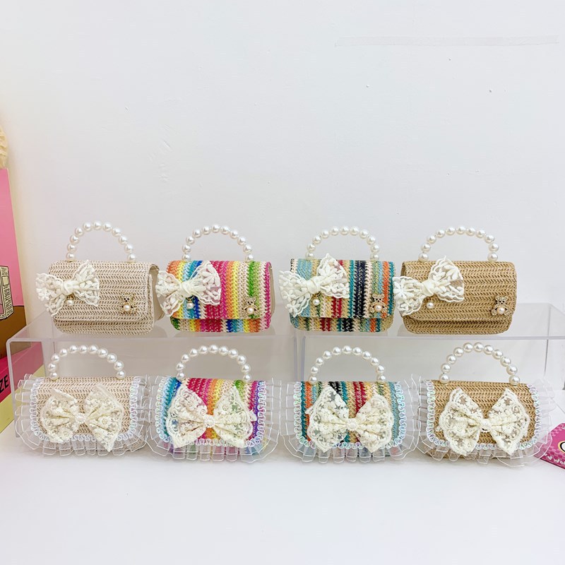 Verano nuevo arco de paja bolso de perla bolso de moda para niños bolso de princesa de jardín de infantes