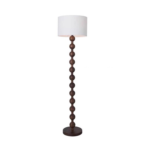 American floor lamp beside Japanese-style living room sofa, Bauhaus-style mid-century bedroom Wabi-sabi atmosphere light luxury standing lamp