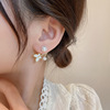 Small design earrings from pearl with bow, 2022 collection, trend of season