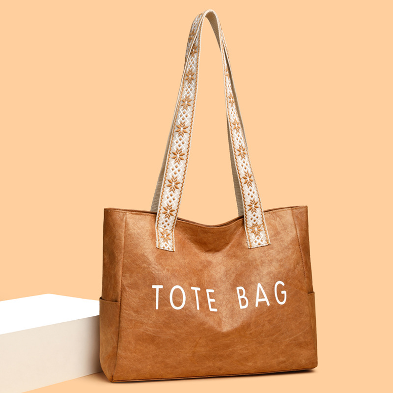 Spring/Summer New Simple Fashion Retro Large Capacity Tote Bag Versatile Cowhide Texture Handbag For Women