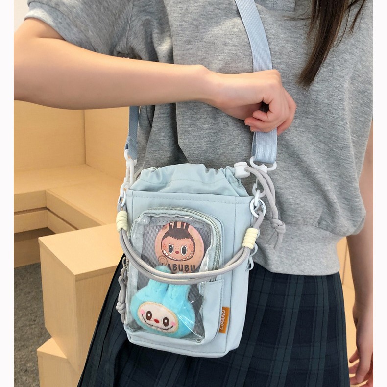New cute girl-style crossbody bag, suitable for casual wear, sports, and outdoor activities; a portable drawstring crossbody bag for women