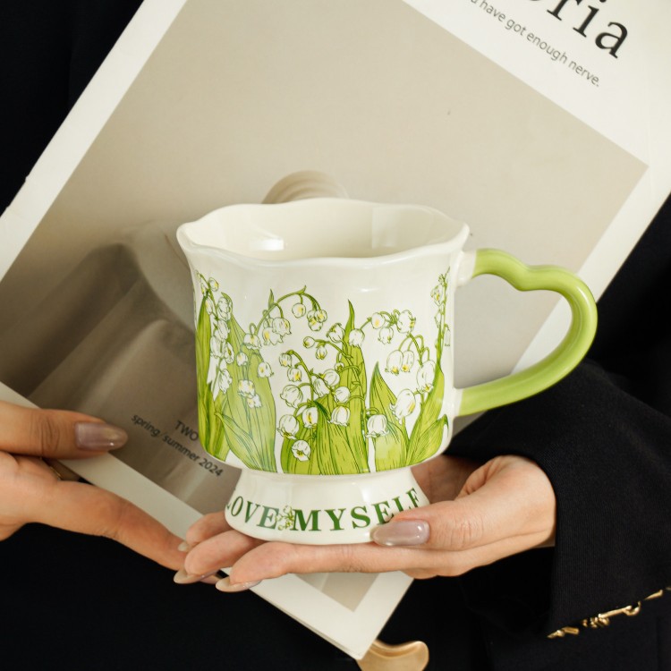 Taza de orquídea de campana de alta calidad taza de cerámica taza de agua de gran capacidad taza de café doméstica de mujer taza de té de oficina