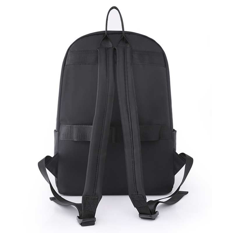 Comercio exterior al por mayor 2023 verano nuevo estilo versión coreana de las señoras mochila de nailon mochila simple de color sólido de gran capacidad para estudiantes