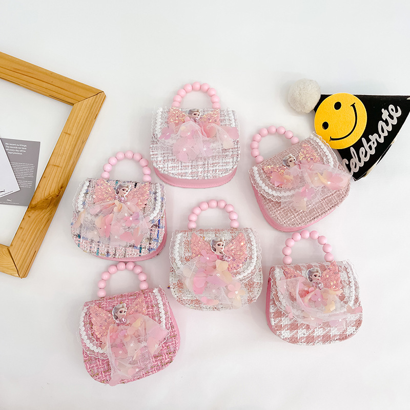 2022 nuevos niños bolso de hombro crossbody Chanel estilo niñas bolsa perla portátil accesorios de dibujos animados bolsa de desgaste