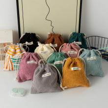 大容量纯色灯芯绒收纳袋抽绳束口化妆包女便携随身口红包零钱包