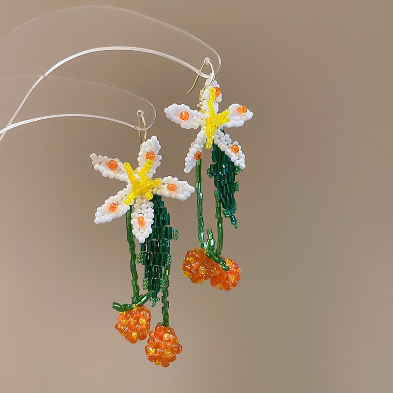 Pendientes de borla de flores de gasa de aguja de plata Pendientes de dopamina de bosque dulce Pendientes de todo fósforo de tendencia de nicho Mujeres al por mayor