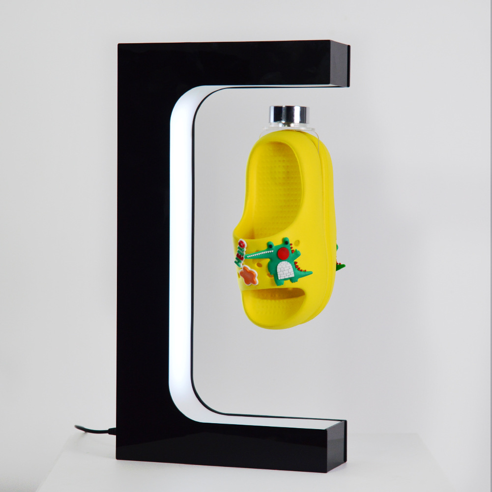 跨境直供磁悬浮展示架亚克力促销台桌面广告旋转展示台磁悬浮拖鞋