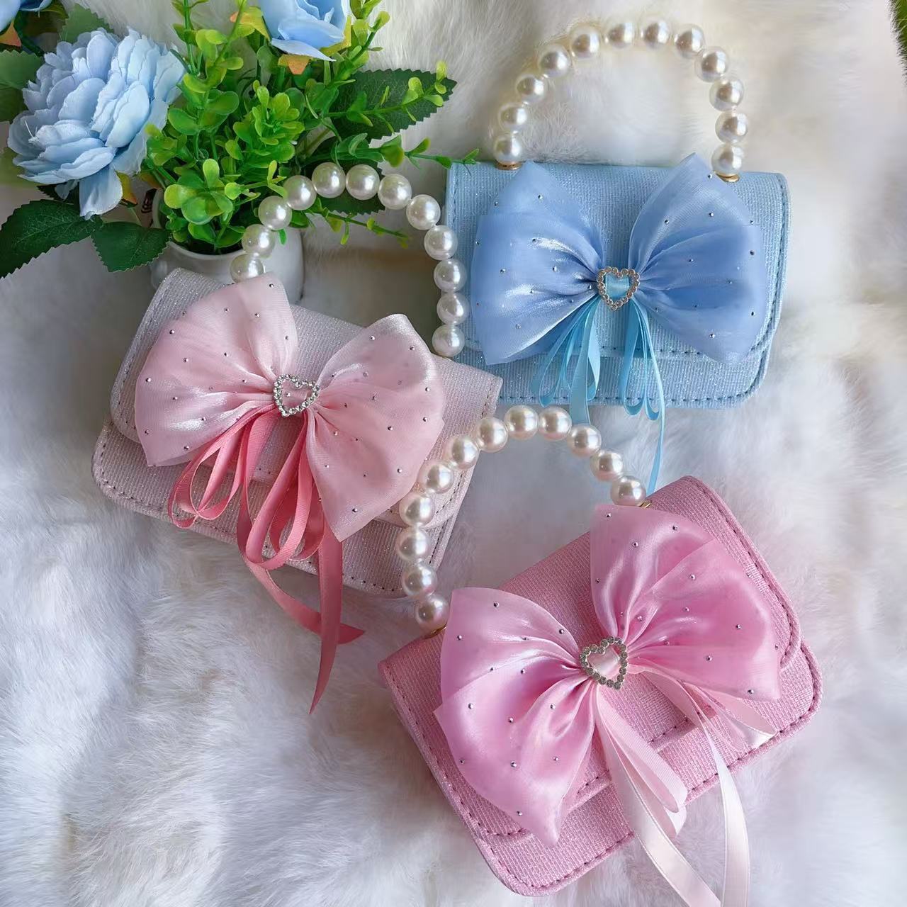 Nuevo tipo de bolsos para niños, bolsos de moda, bolsos de princesa de viento, bolsos portátiles lindos para chicas, bolsos de red para bebés.