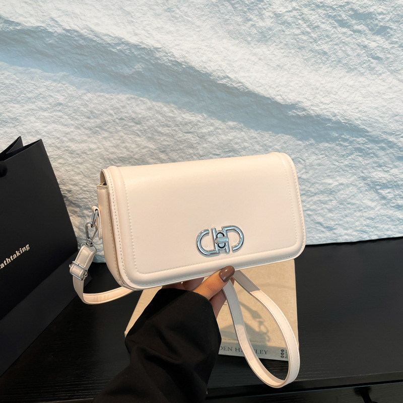 2025 primavera nuevo nicho de estilo estilo extranjero estilo de moda de color sólido bolso de bloqueo personalidad elegante bolso de hombro