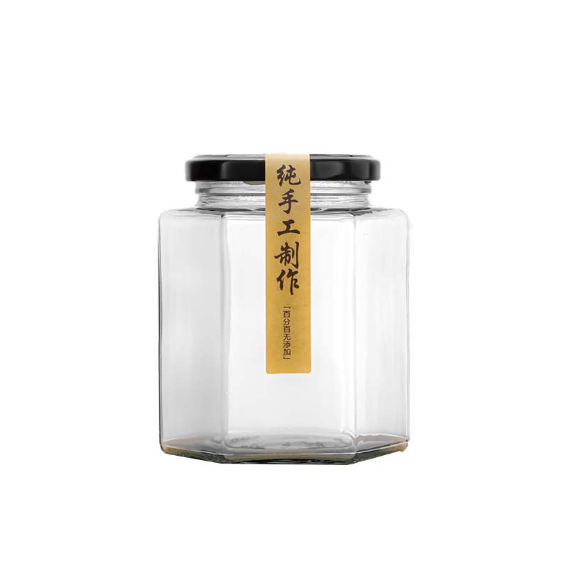 Botella de vidrio hexagonal botella sellada frasco grado alimenticio crema de limón con tapa una libra de miel salsa de chile mermelada botella hexagonal vacía