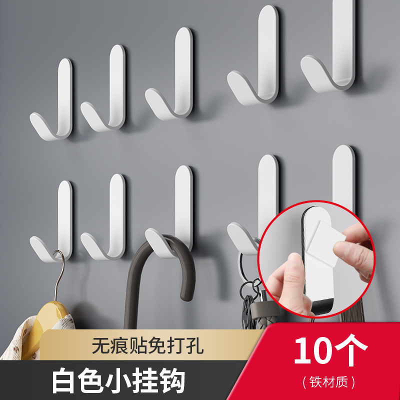 フックの強い接着剤をフックして、穴を開けないようにします。|undefined