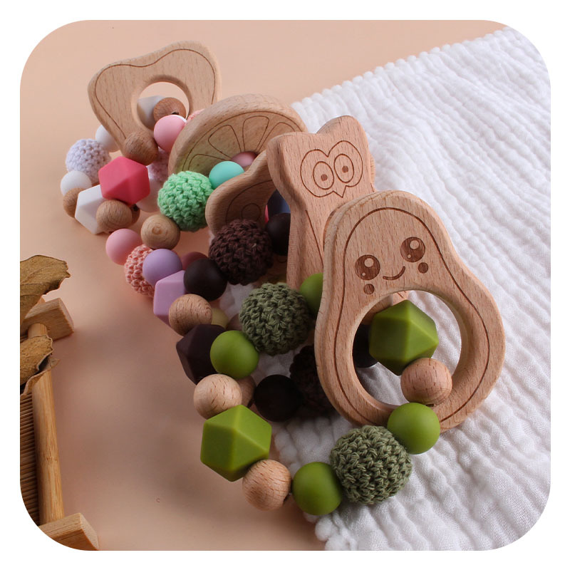 Nuevo DIY creativo de la historieta haya mordedor bebé haya aguacate silicona pulsera mordedor molienda varilla