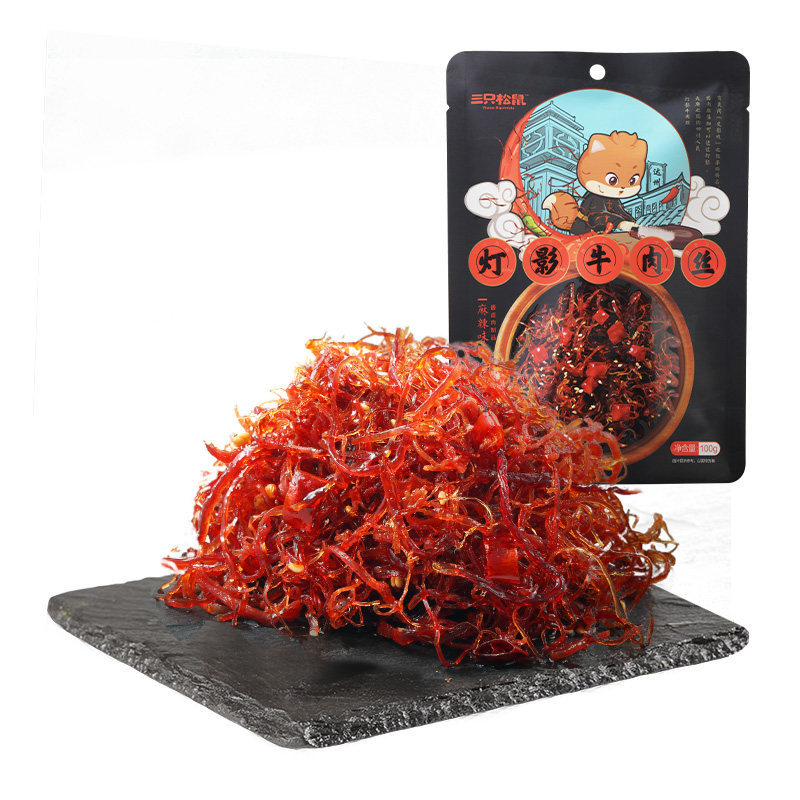 One piece of "Three Squirrels Light Shadow Beef Snacks" 100g, a spicy, ready-to-eat beef snack in a standalone package.