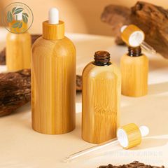 竹のゴムの頭の点滴の瓶の精華の液体の携帯は瓶の竹の製の光を避ける精華を分けて瓶の竹の木を分けて瓶を詰めます