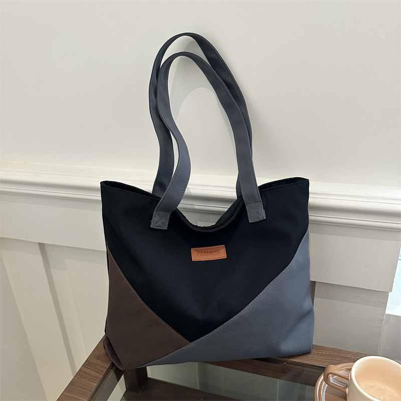 Bolsa de tela de gran capacidad para mujeres 2024 nuevo bolso de alta calidad nicho bolso de viaje bolso de hombro de moda