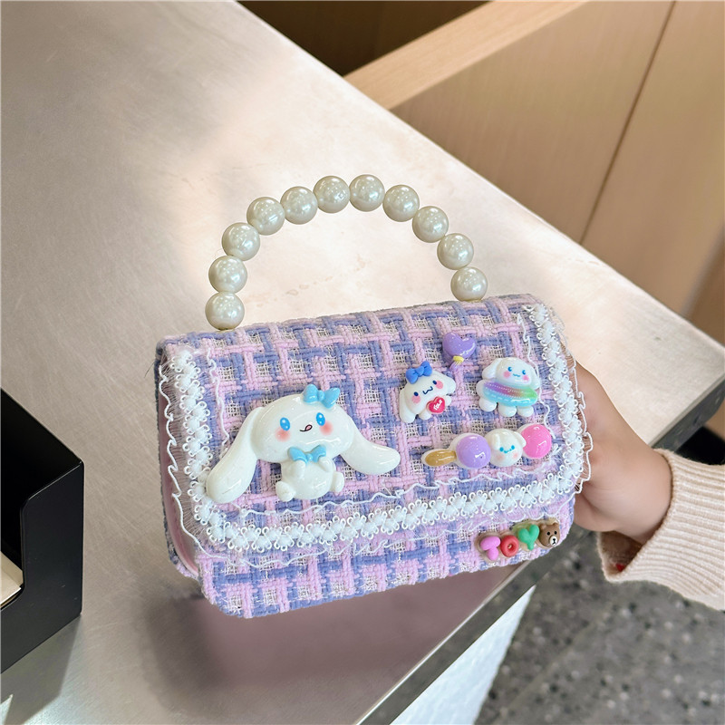 Otoño e Invierno nueva niña monedero dibujos animados lindo accesorios perla bolso versátil estilo occidental bebé bolsa de hombro