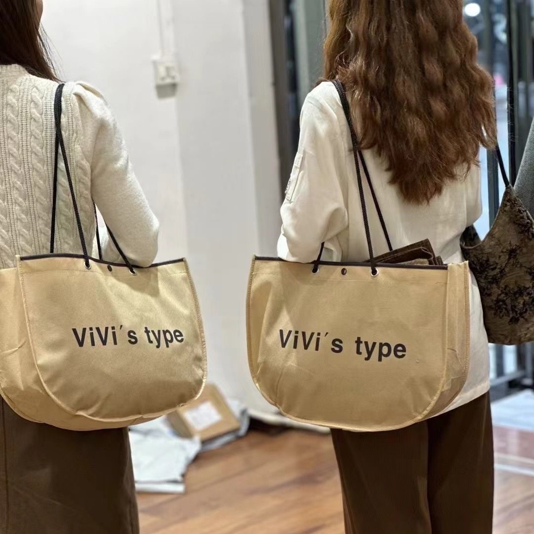 包邮可印logo月亮包车缝无纺布袋手提袋女装服装袋加厚网红袋