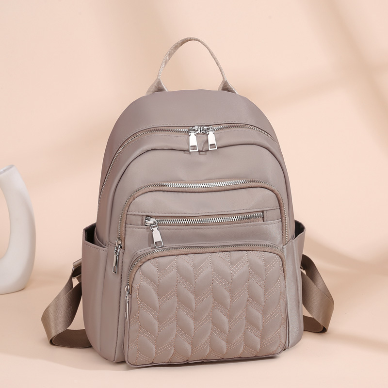 2025 nueva mochila de nylon impermeable transfronteriza mochila de damas de transporte urbano de gran capacidad de moda mochila de estudiantes