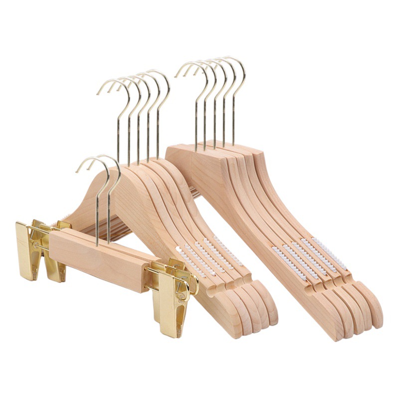 Perchas de madera maciza al por mayor tienda de ropa especial de madera antideslizante flocado para hombres y mujeres tienda de ropa colgante soporte de ropa clip para pantalones logo