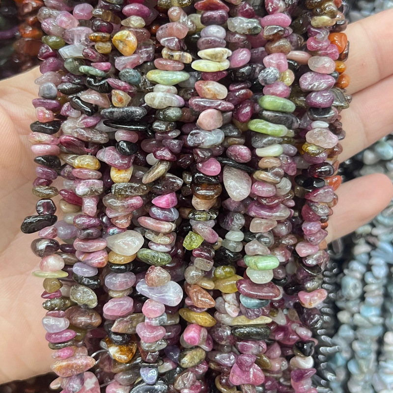 A natural tourmaline strand, approximately 80cm in length