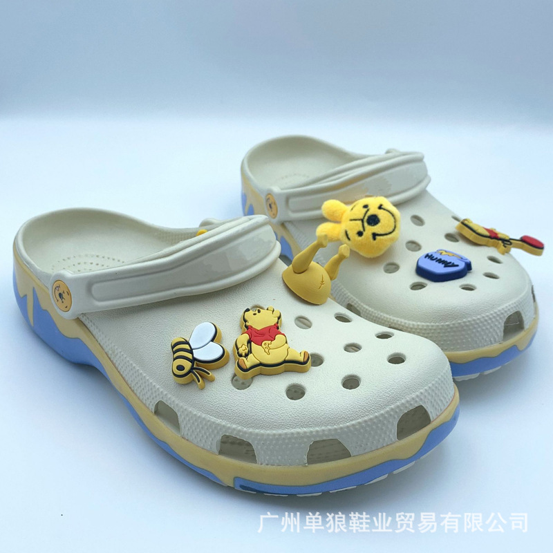 Verano nuevo agujero zapatos de dibujos animados Winnie el Pooh hombre y mujer ocio transpirable sandálias de playa suaves zapatillas fábrica al por mayor