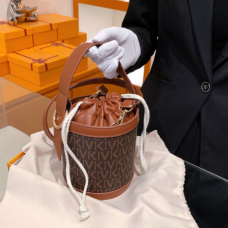 New high-end texture women's bag bucket bag women's mini shoulder crossbody bag summer soft leather popular small bag_voghion.com