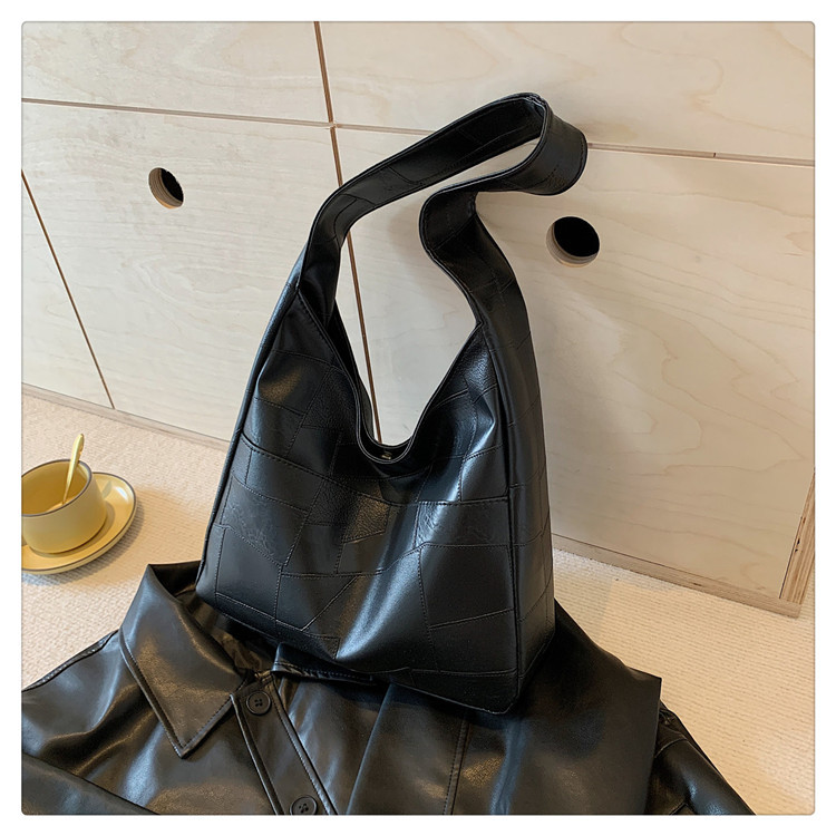 Bolso de color sólido para mujeres 2024 primavera y verano nueva bolsa de gran capacidad bolsa de moda extranjera bolsa de hombro mochila bolsa de viaje