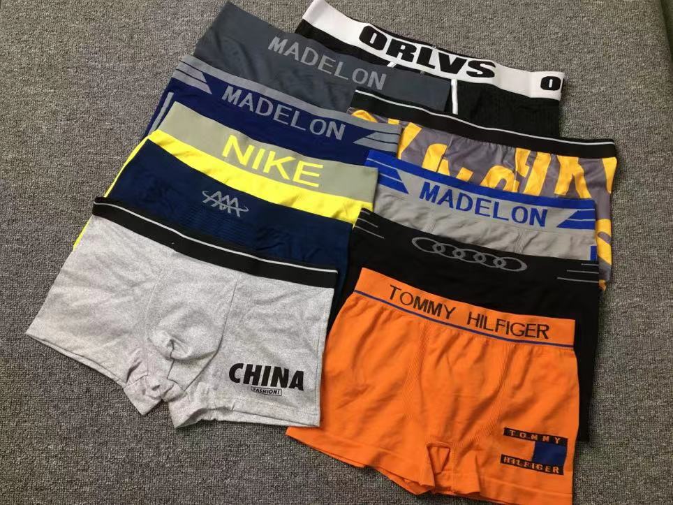 Diverso suelta más tamaño boxeadores ropa interior de moda al por mayor de los hombres El Comercio exterior europeo y americano sin costuras ropa interior ultrafina transpirable mezclado