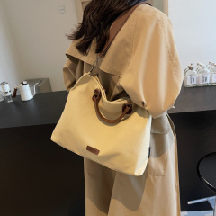 外国貿易のキャンバスバッグの女性バッグのレトロなファッションの大容量のファッションのハンドバッグの女性のシンプルな組み合わせの肩の斜めの女性バッグ