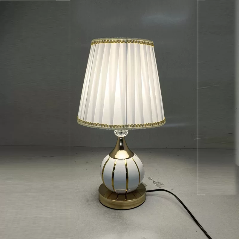 Modern and minimalistic ceramic table lamp for bed for bedroom