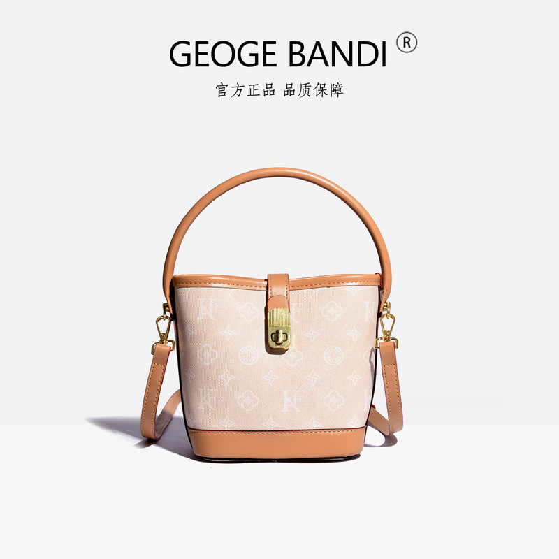 2026 Spring New Fashion Trend: Popular European and American Letter Pattern Lock Buckle Bucket Handbag for Women, Can Be Used as Handbag, Shoulder Bag, or Crossbody Bag