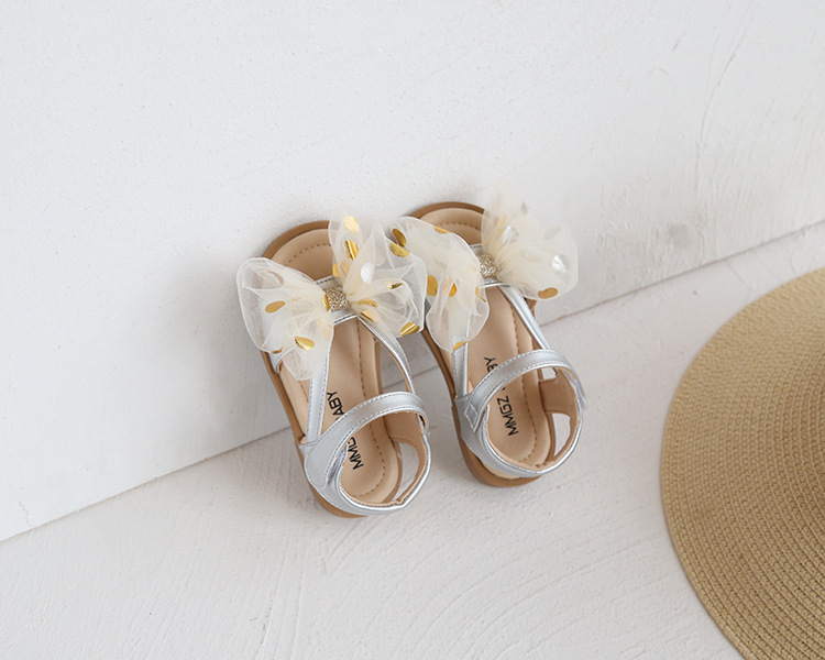 Versione coreana di fiori dolci da bambina con grande fiocco, scarpe per bambini, sandali per le vacanze al mare, estate 2021_voghion.com