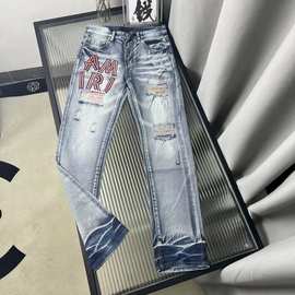 潮牌贴布补丁破洞男士AM刺绣修身牛仔裤潮流小脚显瘦个性裤子