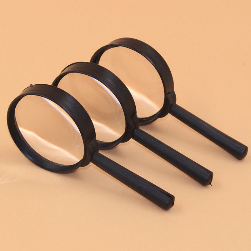 magnifier student Loupe optics children pupil old age the elderly read Read newspapers hold