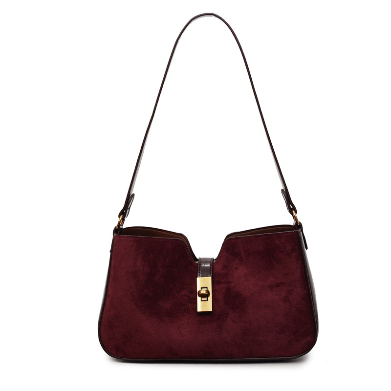 Transfronterizos de alto nivel esmerizado bolsas de brazo portátiles mujeres 2025 invierno nuevo tipo de lujo nicho bolso de hombro de viaje mochila