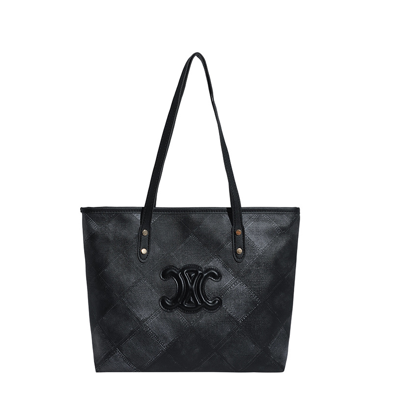 Bolsa de mano transfronteriza de gran capacidad para mujeres 2025, nueva sensación de alta calidad, bolso de hombro de viaje universal, bolso de moda
