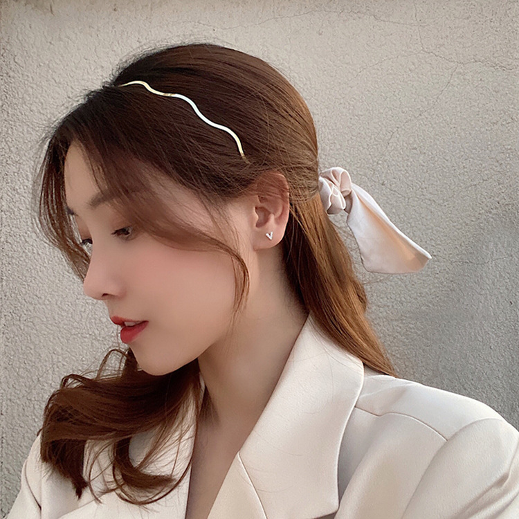 Simple Style Solid Color Metal Polishing Hair Band display picture 2