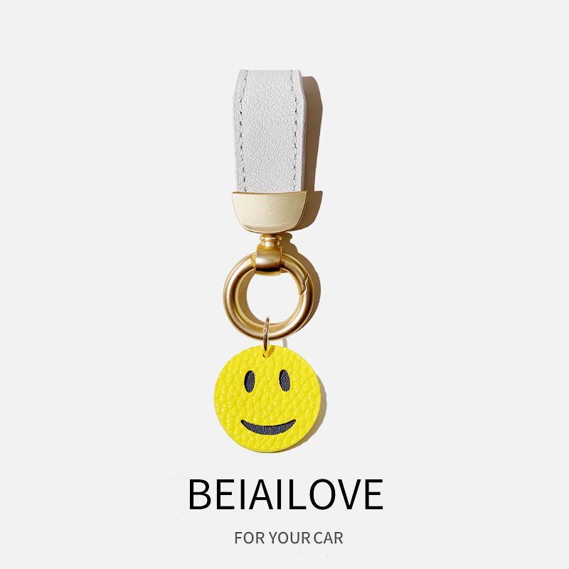 Estilo francés de alta gama de cuero fresco cuerda coche llavero simple lindo clave colgante Pequeño Libro Rojo mismo estilo girasol