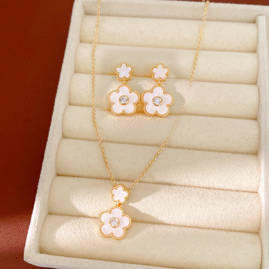 Collar de orejas de piedra de oro real, collar de orejas de flores de lujo ligero, collar de clavícula de nicho, conjunto de joyas simples y dulces.