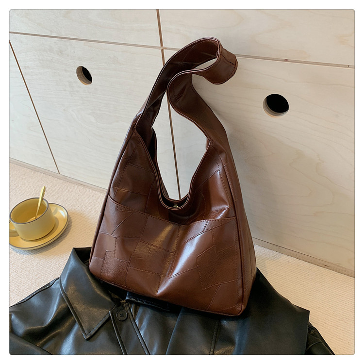Bolso de color sólido para mujeres 2024 primavera y verano nueva bolsa de gran capacidad bolsa de moda extranjera bolsa de hombro mochila bolsa de viaje