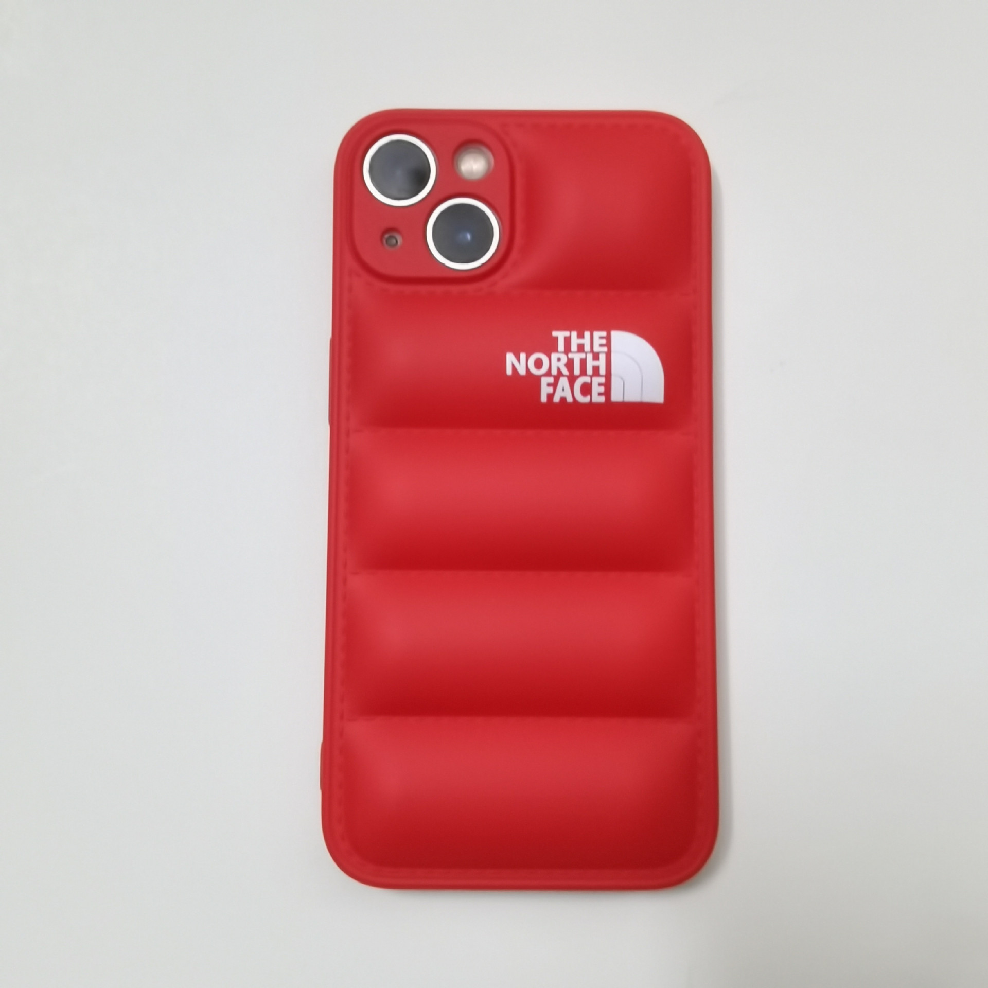 Chaqueta de plumón norte de la marca Chaozhou para iphone16Promax carcasa líquida 15pro Apple 13/12/11 transfronterizo