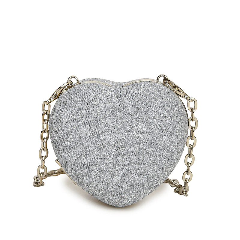 Pequeño viento japonés de fragancia personalidad de color caramelo de corazón de melocotón mini auriculares para mujeres bolsas de 24 verano nuevo hombro mochila