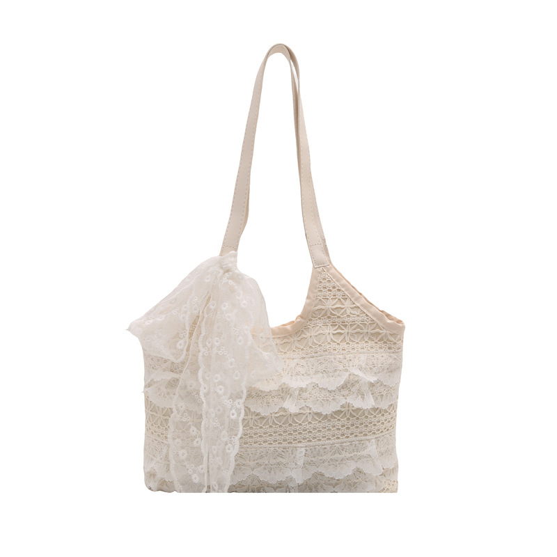 Bolsos de gran capacidad para mujer 2025 nuevo bolso de hombro tejido hueco de encaje de verano para estudiantes universitarios