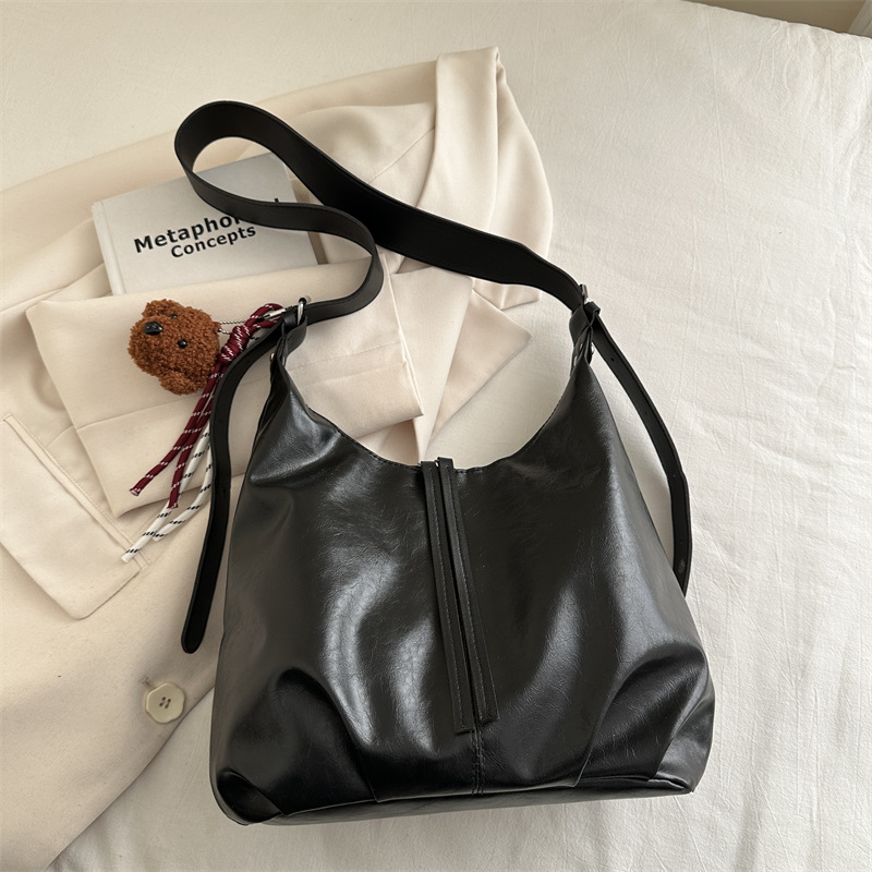 Alta sensación de viaje retro bolso de hombro de invierno 2024 nuevo bolso de mujer bolso de cuero suave brazo bolso de trabajo moda