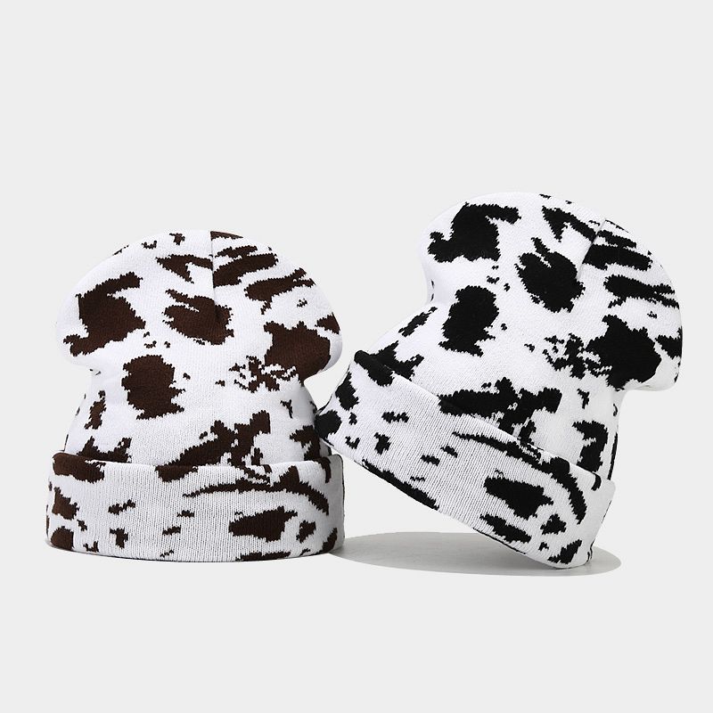 Moda europea y americana Nueva leopardo Jacquard sombrero de punto engrosado cálido hombres y mujeres otoño e invierno Gran circunferencia de la cabeza protección del oído sombrero de lana